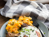 SLOW COOKER PORK CHOPS WITH CREAMY HERB SAUCE