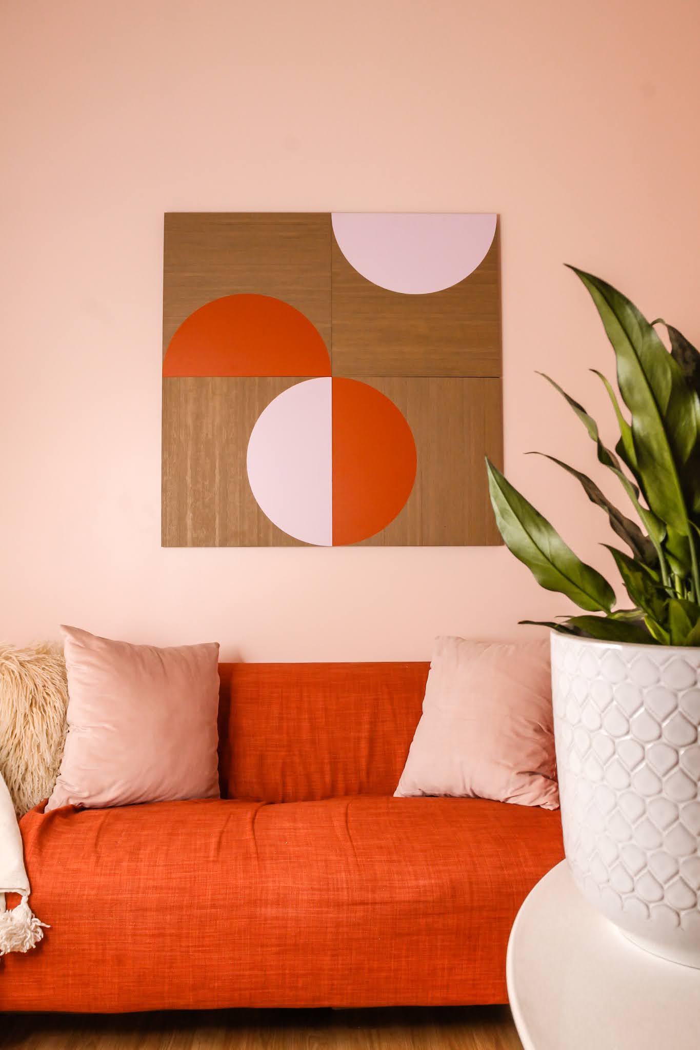 pink and orange decor // spacekit // spacekit decor // sustainable wall art // sustainable home decor // pink and orange room // colorful homes // pink walls // unique wall art // eco friendly wall art // modular wall art // pink room // orange room // orange couch // pink walls // NYC homes // home decor Inspo // office decor inspo // living room inspo // colorful home inspo // space kit modular wall decor // spacekit half moon design // / wall decor inspo // small space living // small spaces inspo // pink room inspo // pink office decor inspo // colorful rooms // sustainable wall decor // sustainable home decor