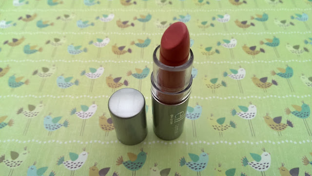 A photo of an elf lipstick with the lid off