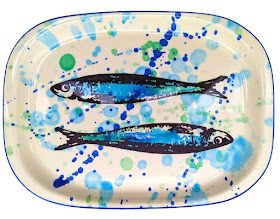 colorful serving platter with two sardines