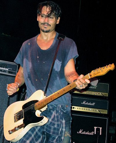 johnny depp guitar. Never Mind The Sweat Patches.