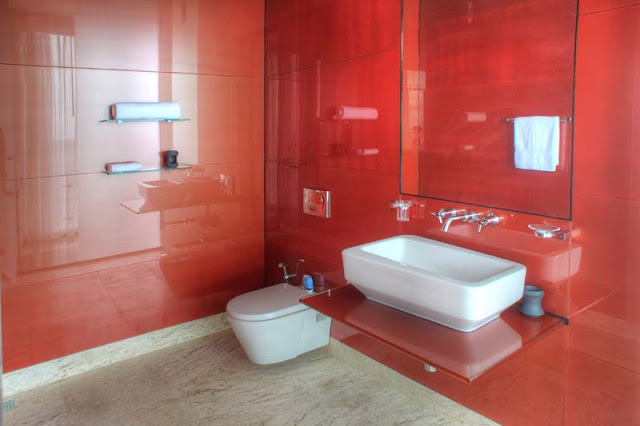 Red wall modern bathroom 