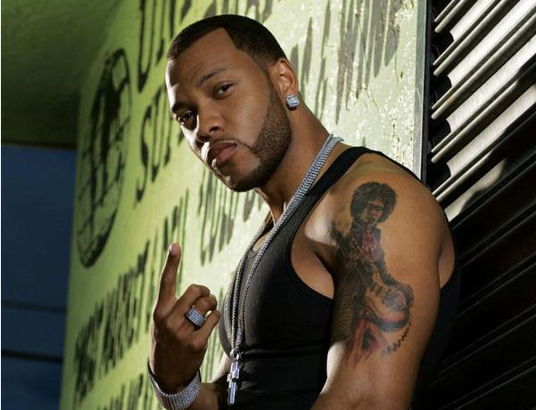 flo rida back tattoo. bears-tattoo-guy.