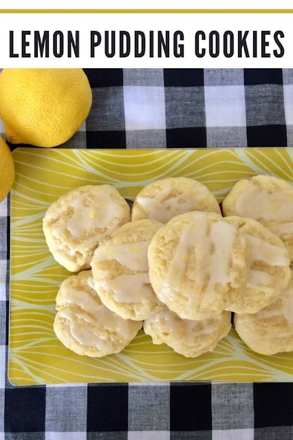 Plate of lemon pudding cookies with lemons.