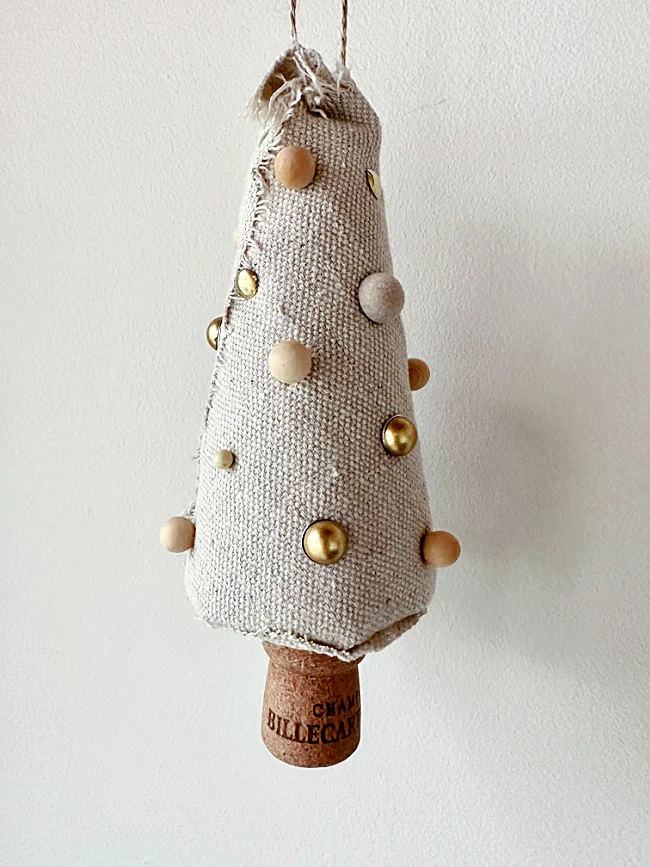 tree with several different finishes push pins
