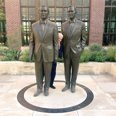 Lol. Bill Clinton Seen Hiding Behind Some Bushes