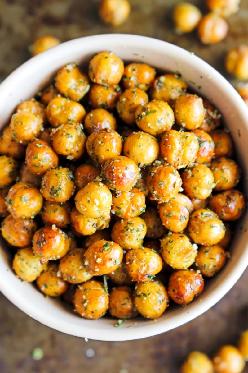 Crispy Air Fryer Ranch Chickpeas in a bowl on a metal background.