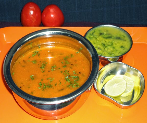 tomato curry in a serving bowl