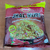 Makan Jhal Muri (Puffed Rice Mixed with Spices and Peanut)