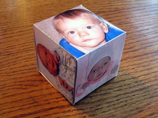 http://digi-scrapping.blogspot.com/2009/11/photo-cube-and-freebie-template.html