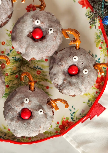 donuts on a round christmas tree plate.