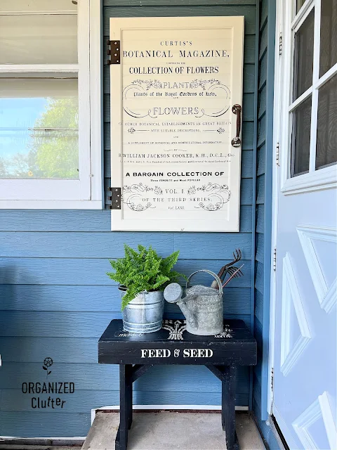 Photo of rustic botanical wall decor with a cabinet door, rusty hardware & a decor transfer.