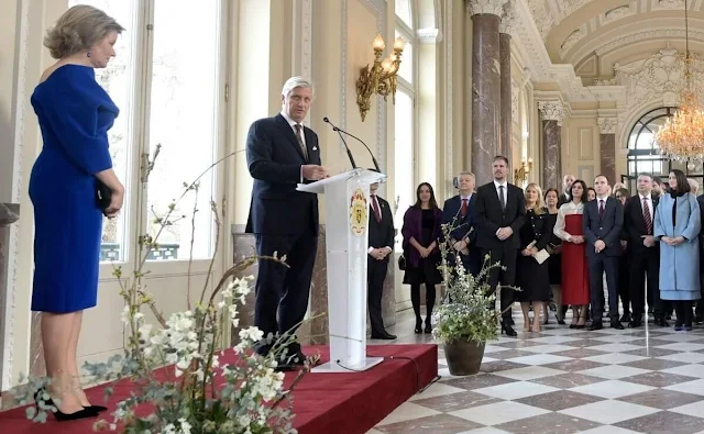 Queen Mathilde wore a royal blue velvet flexible scuba dress by Natan for the European institutions meeting