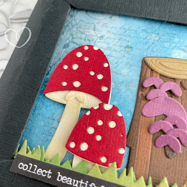 Mushroom and tree stump panel made with cardstock, stamps and die cuts.