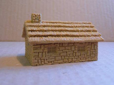 7302 Thatched Stone House