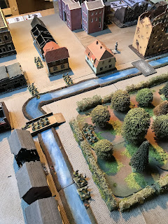 Canadian infantry move through Mons