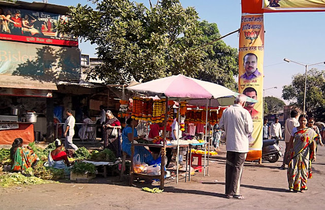 crowded vegetable market on the road