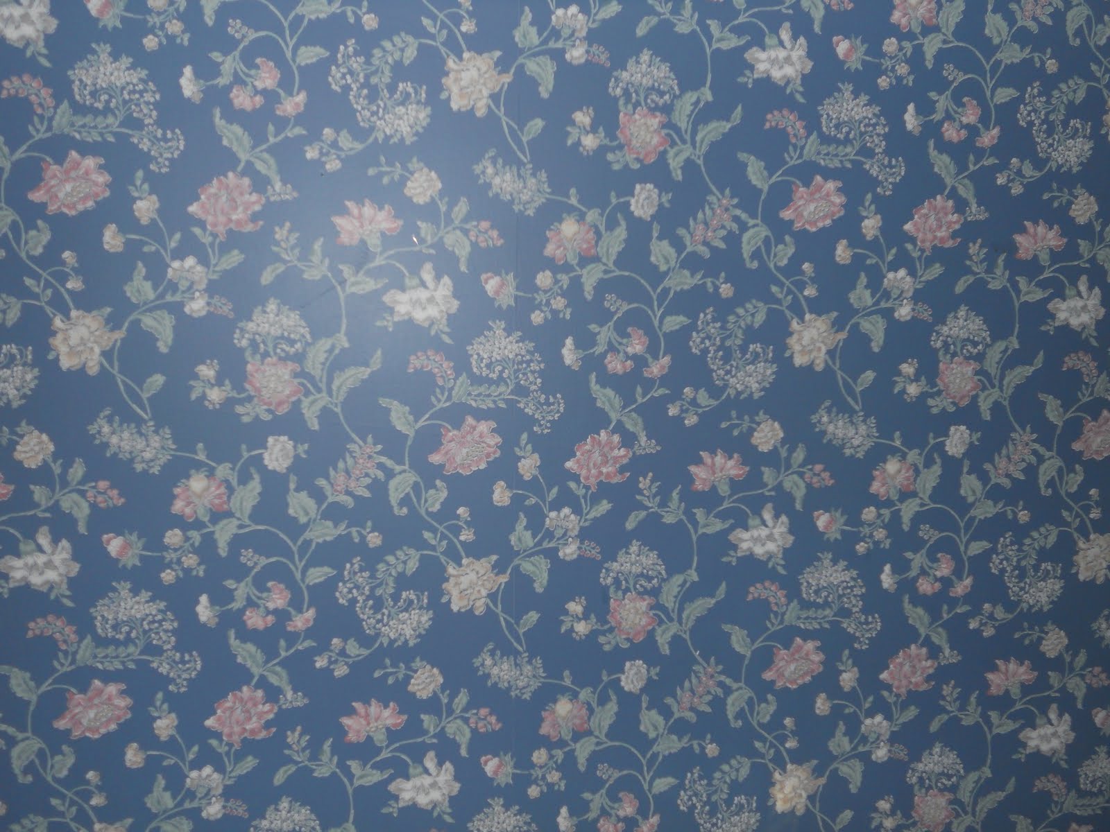 This soothing blue floral wallpaper is found in room 504, among others ...