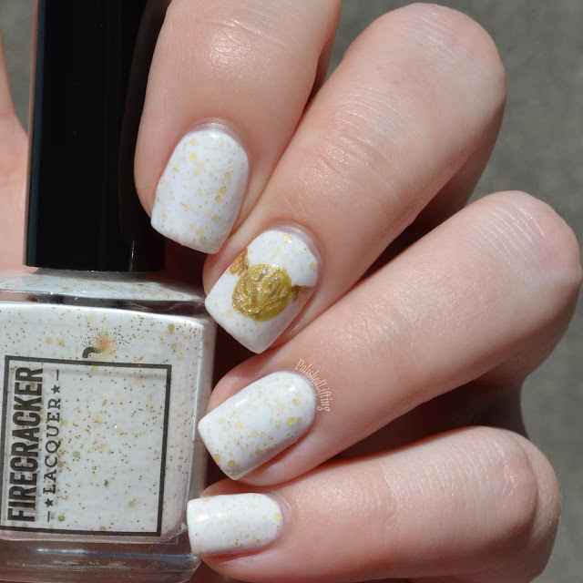 white nail polish with gold glitter