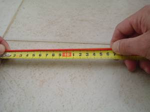 Measure and cut off 17cm of red cord