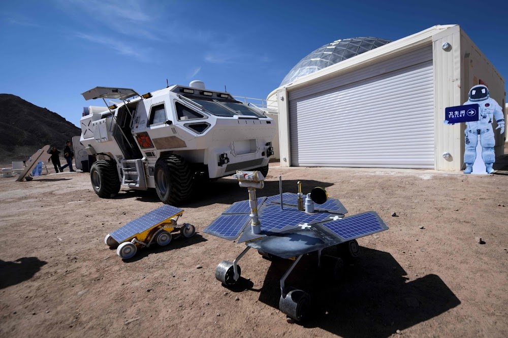 China's C-Space Mars simulation base in Gobi desert (rover parked at base)