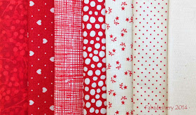 Red and white patchwork fabrics - Nearly Insane Quilt