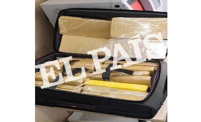 Imgem da mala com pacotes de cocaína do sargente da comitiva de Bolsonaro