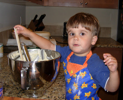 boy thinking about doing something with that bowl