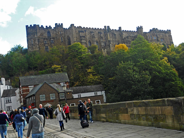 Durham, Bridges, Elvet Bridge,  Framwellgates, Millburngates, Prebends, River Wear, United Kingdom, Tyne and Wear,During our visit to Durham, the one thing that overwhelmed me was the sheer number of bridges in the city. But on looking closer at the geography of the city, it does not seem so strange because the river Wear crosses the city not once but twice. It forms a kind a peninsula. So if you have to get from any one given point to the other, you need to cross atleast two bridges over the rivers. Most of these bridges are very old, but there are a few new ones as well.The Millburngates Bridge - This was different from most of the other bridges in its obviously modern architecture and construction. The photo was clicked from the Framwellgates Bridge, which leads up to the Durham Castle and the Cathedral.Perhaps the most scenic of all the bridges, this is the old Elvet Bridge The bridge was constructed in 1160 AD and provides some spectacular views of the river Wear. A walk originating from the river running parallel to the river Wear should not be missed.This shot was taken from the Framwellgates Bridge as well. The bridge in the distance is the Prebends Bridge after which the river takes a sharp U turn. The towers looming in the top-left are the West Towers of the Durham Cathedral.This is on the top of the Framwellgates Bridge. The bridge itself is very similar to the Old Elvet bridge in construction though is slightly larger.