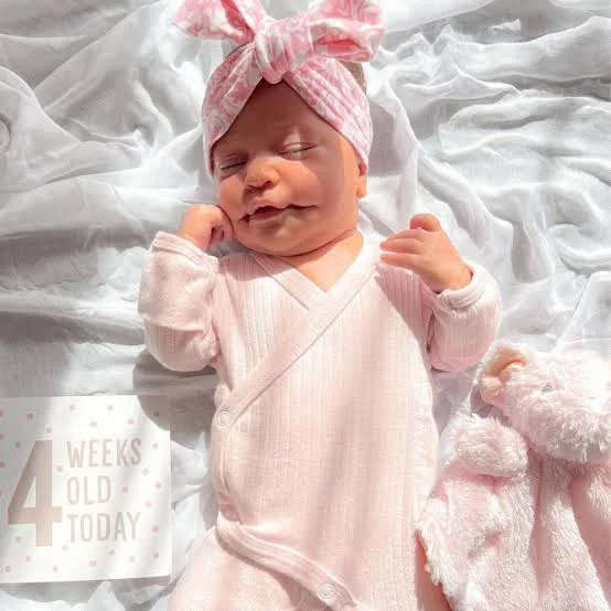 Baby with permanent smile