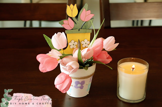 Spring flower Terra Cotta pot on table