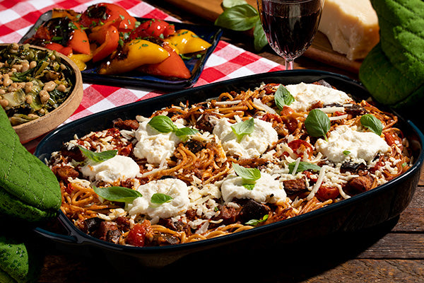 Espaguetis al horno con tomate asado y ricotta