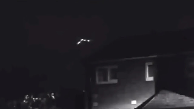Triangle shape UFO flying over homes in the UK.