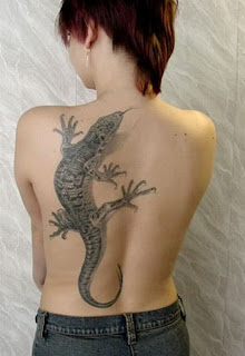 gecko tattoo on his back