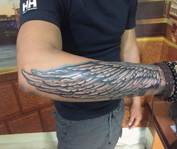 50 Incredible Wing Tattoos Ideas and Designs (2018) - Wing+tattoo+on+arm+1