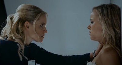 Tessa (Karoliina Blackburn) chokes Peppi Kuula (Sara Parikka)