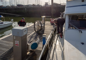 Photo of Phil filling up Ravensdale's diesel tank