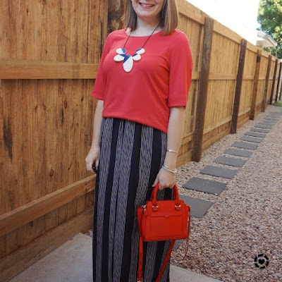 awayfromtheblue Instagram | red slouchy tee with vertical stripe maxi skirt statement necklace