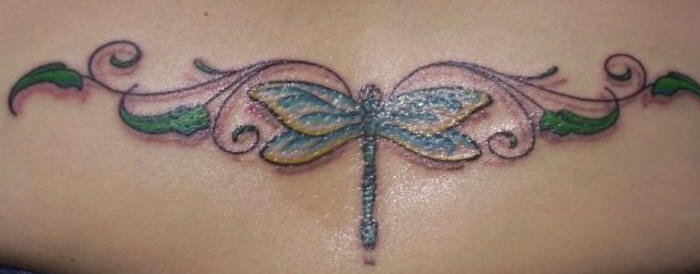 Colorful Dragonfly and flower tattoo Lower back dragon fly tattoo