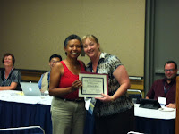 Leslie Reynolds presenting the SLA IT Divisionoutstanding member award to Jill