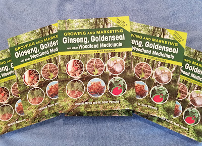 Stack of the book "Growing and Marketing Ginseng, Goldenseal and Other Woodland Medicinals"