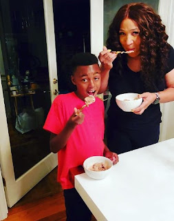 Kym Whitley with her son Johnson eating ice cream