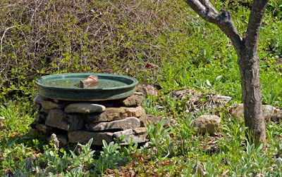 pottery and rock birdbath