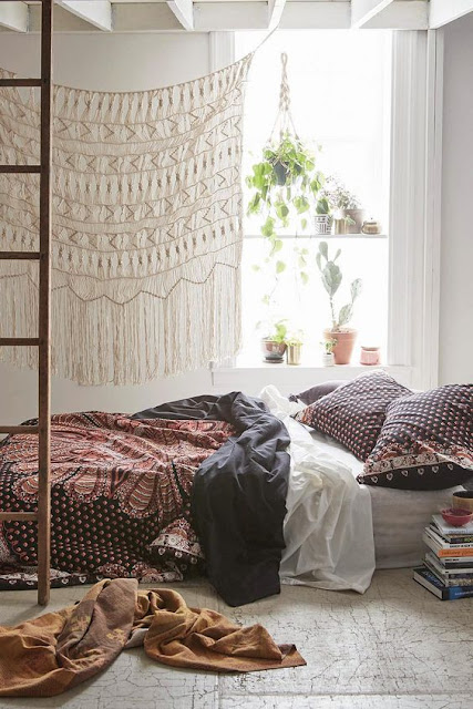 bohemian bedroom with a large macrame