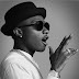 #MAdeInLagos: See The Moment Wizkid Prostrates For A Fan Who Came On Stage To Prostrate For Him (Photo)