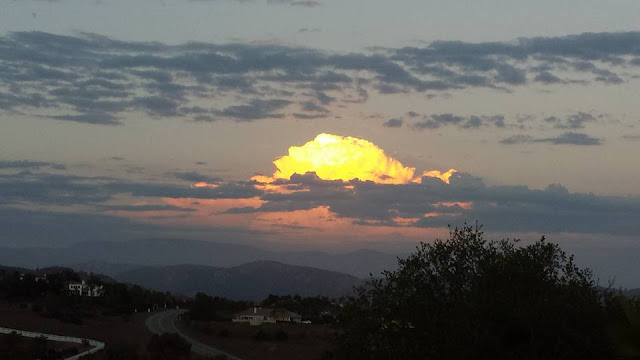 Night time sky with illuminated clouds