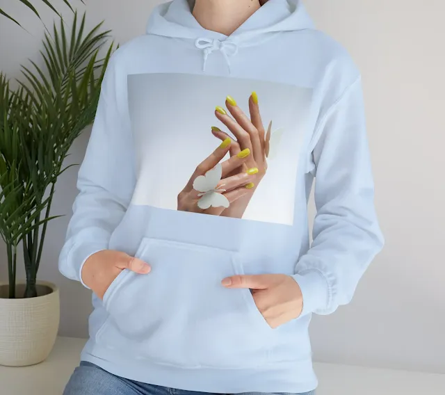 A Hoodie With Woman's Yellow nail, Designed with Nail Art