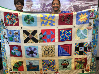 Sonya Hodges & Teresa Kemp with the last UGRR Quilt Code Quilt  made with her late mother it will be on exhibit at the Delta Arts Center Exhibit.