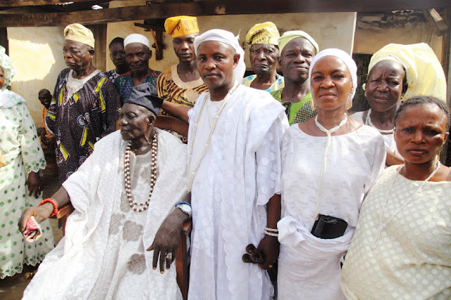 Baba Iyaji (seated) and his entourage