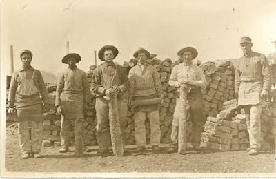 Group of six iron mining workers